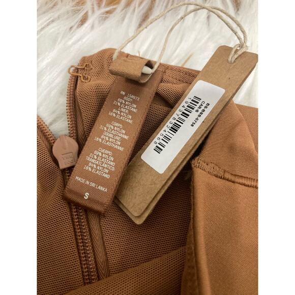 SKIMS Size Small ALL-IN-ONE LONG SLEEVE MID THIGH ONESIE CARAMEL NWT Jumpsuit - Picture 7 of 7